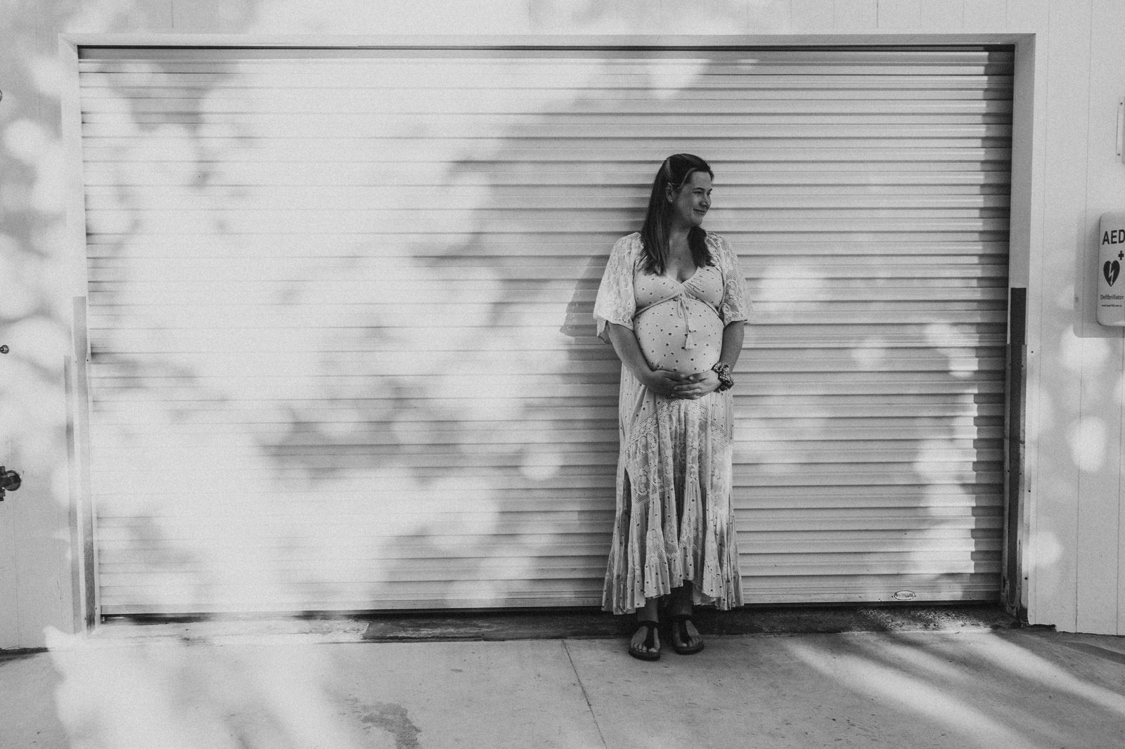 Amy, pregnant, at home